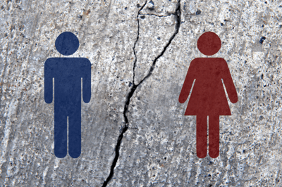 Male and female pictograms on broken asphalt, broken human relationship images stock photo