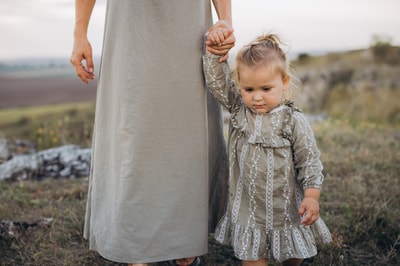 Woman walking with child
