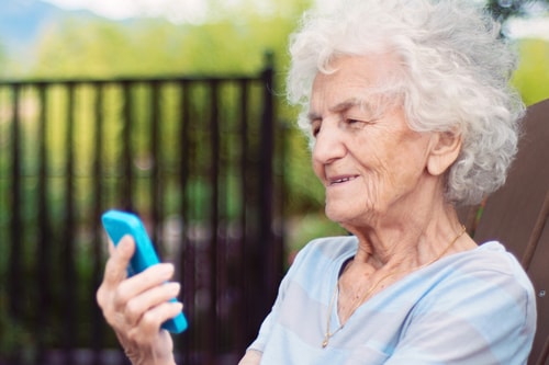 Elderly woman with mobile phone