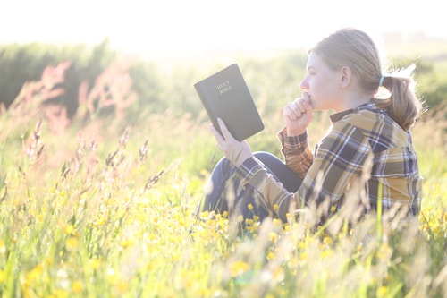 Girl reading Bible