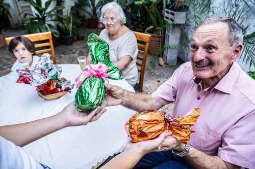 Man receiving Easter eggs