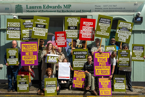 The Other Half campaigning outside Lauren Edward's constituency office