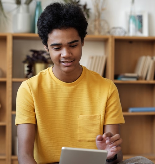 Young man looking at tablet
