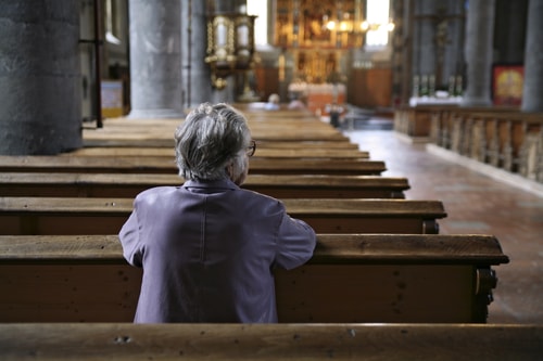 Man in church pew