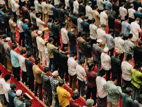 Muslims gathered inside a mosque for prayer, showing unity and devotion in Islamic practice