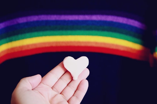 Rainbow heart hand