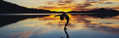 Yoga with sunset background