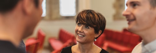 Dawn smiling upwards