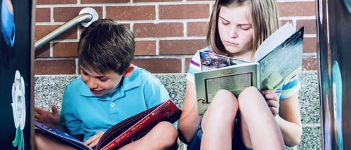Two children reading