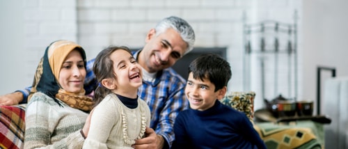 Refugee family laughing