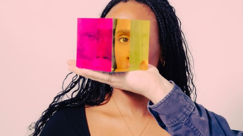 Woman with prism by nick fancher on unsplash square