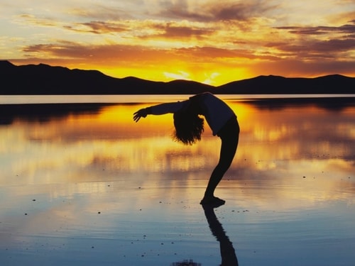 Yoga with sunset background