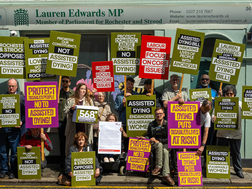 The Other Half campaigning outside Lauren Edward's constituency office